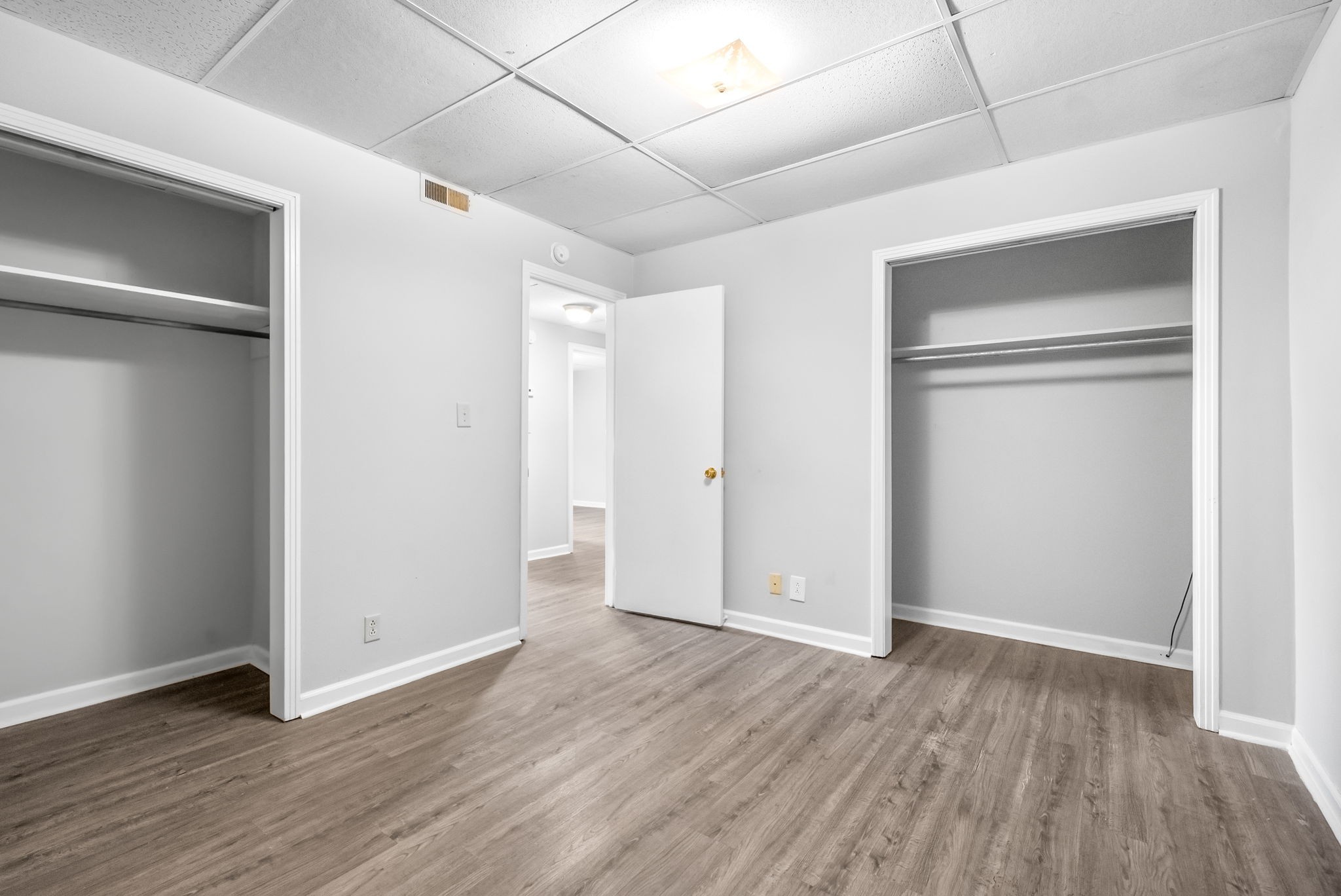 1600 Paradise Hill Road, Unit B Clarksville, TN 37043 - Photo 17 of 20 a view of an empty room with wooden floor