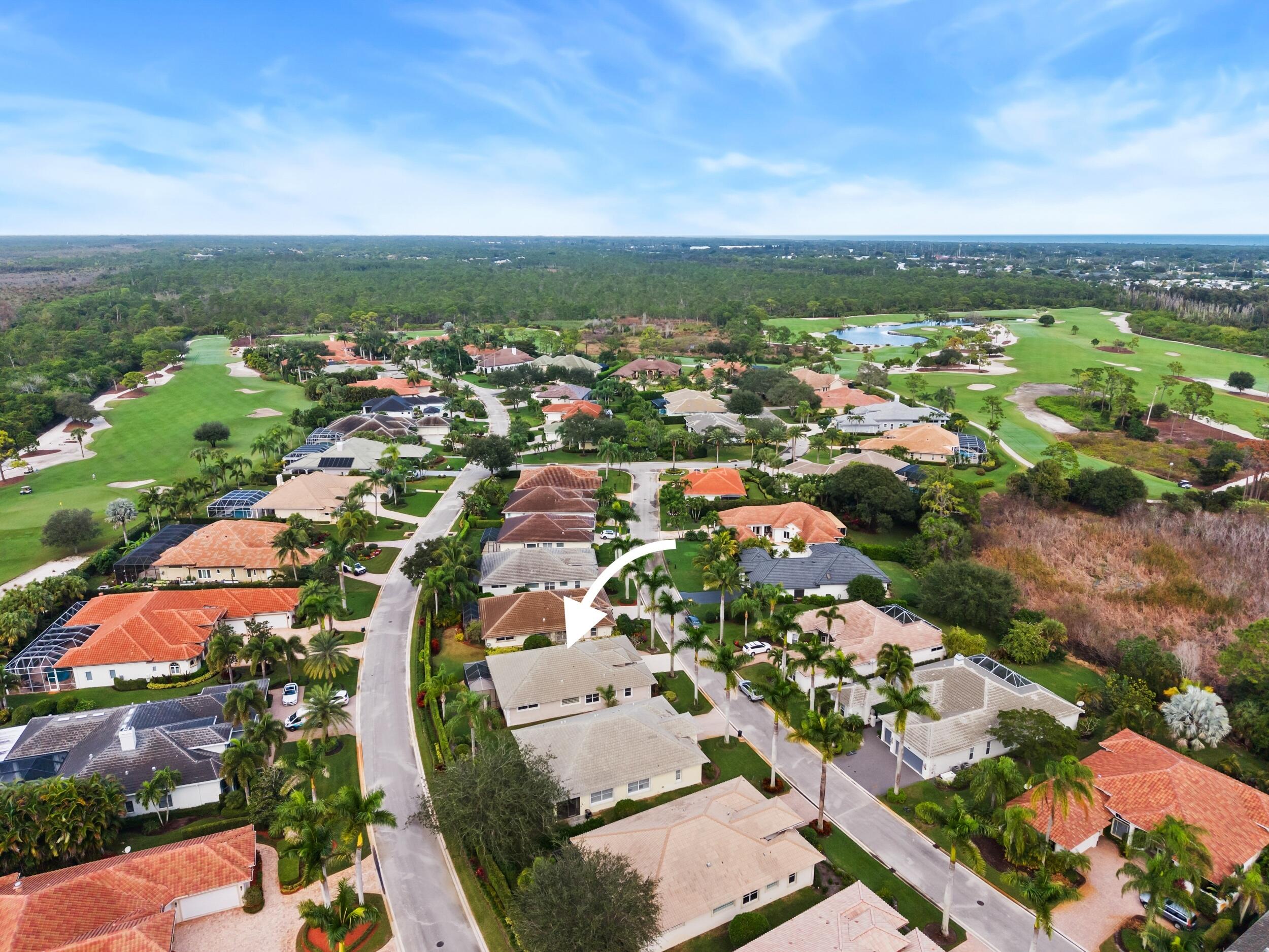 7978 Southeast Hempstead Circle Hobe Sound, FL 33455 - Photo 46 of 64 an aerial view of residential houses with outdoor space