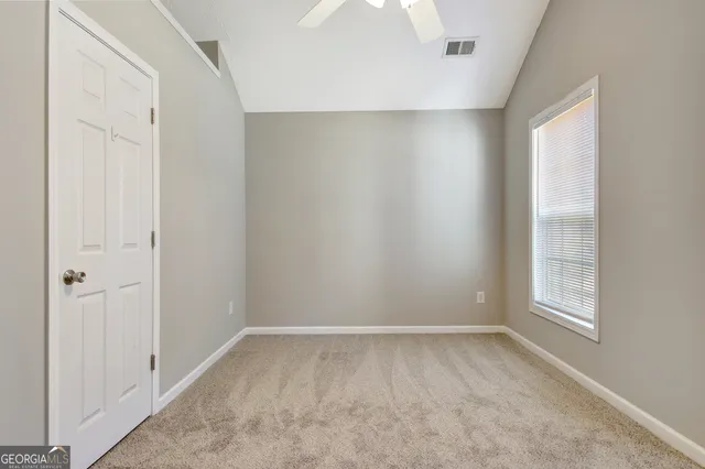 a house view with a backyard space