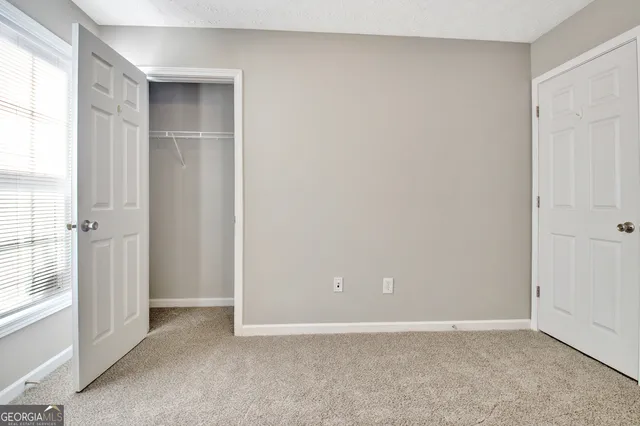 a view of a house with backyard porch and garden