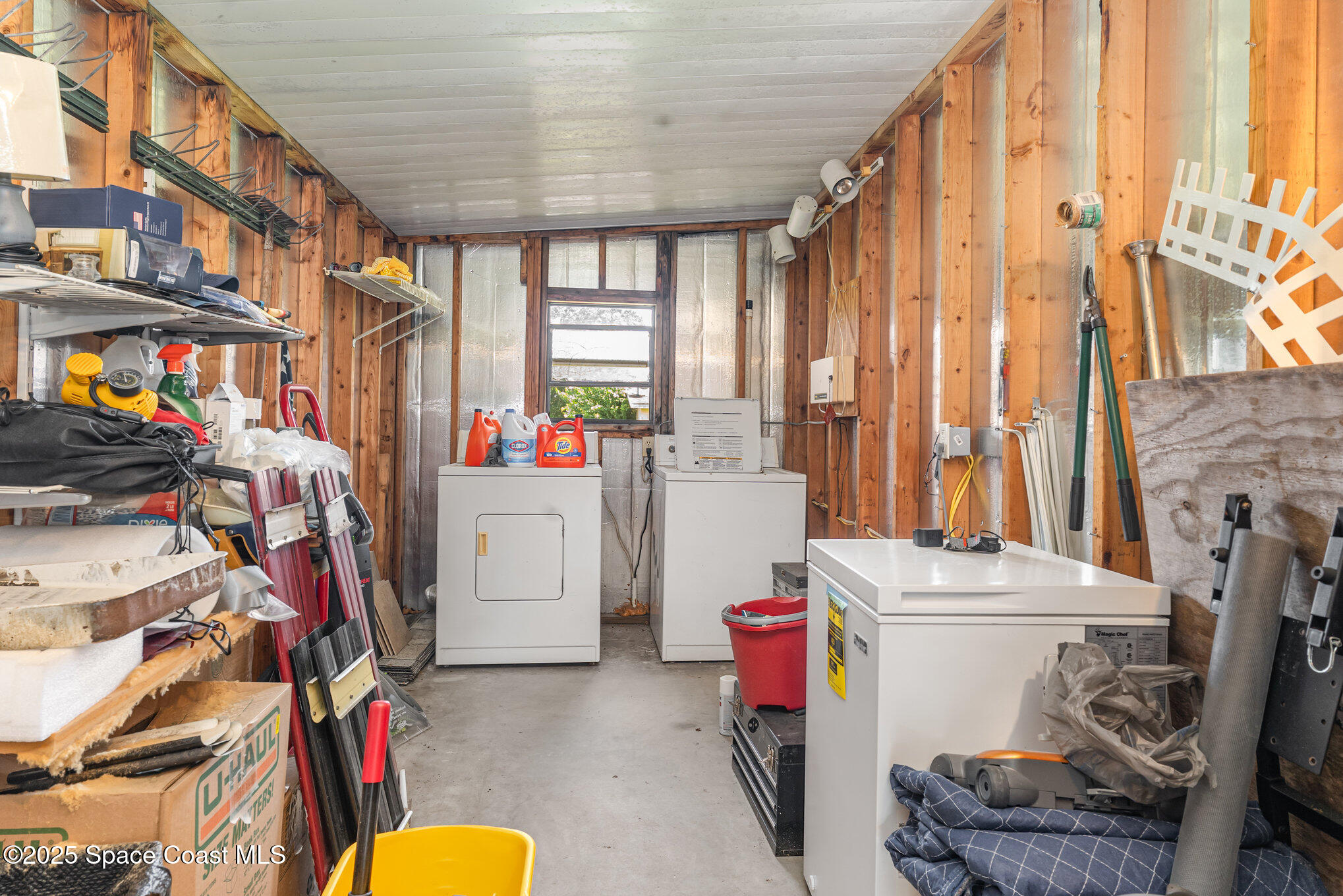 9980 Southwest 101st Lane Ocala, FL 34481 - Photo 21 of 25 a storage room with washer and dryer