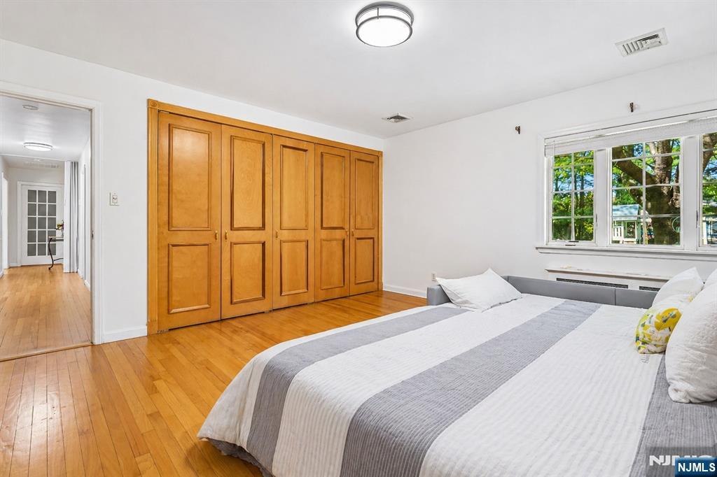 457 Summit Street Norwood, NJ 07648 - Photo 15 of 35 a bedroom with a bed and a window