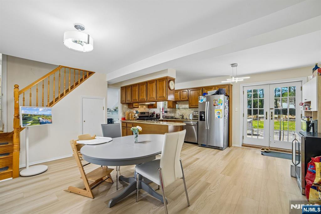 457 Summit Street Norwood, NJ 07648 - Photo 21 of 35 a dining room with furniture and wooden floor