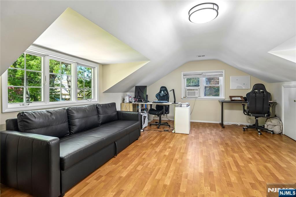 457 Summit Street Norwood, NJ 07648 - Photo 23 of 35 a living room with furniture and a window