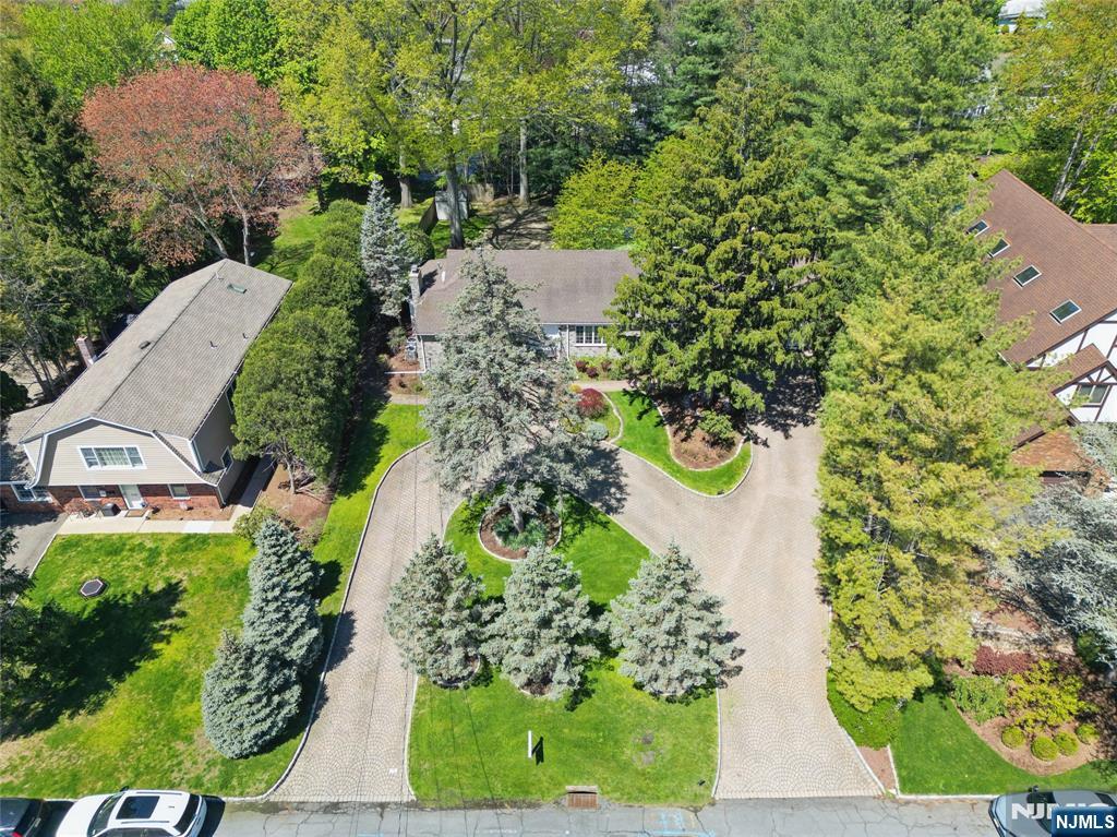 457 Summit Street Norwood, NJ 07648 - Photo 31 of 35 an aerial view of a house with a yard and garden