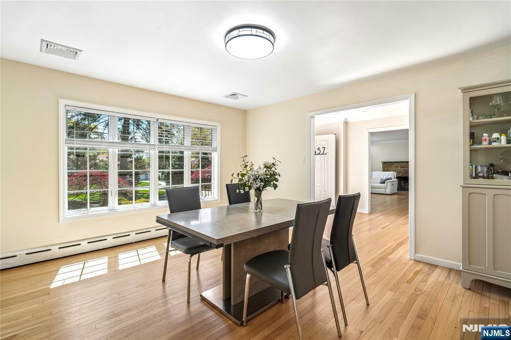 457 Summit Street Norwood, NJ 07648 - Photo 5 of 35 a view of a dining room with furniture window and wooden floor