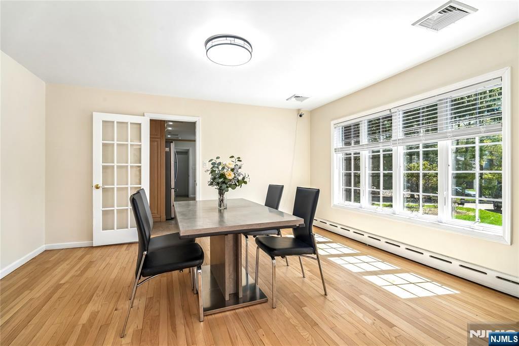 457 Summit Street Norwood, NJ 07648 - Photo 6 of 35 a view of a dining room with furniture and wooden floor