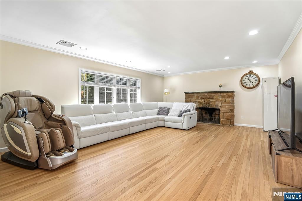 457 Summit Street Norwood, NJ 07648 - Photo 7 of 35 a living room with furniture window and a fireplace