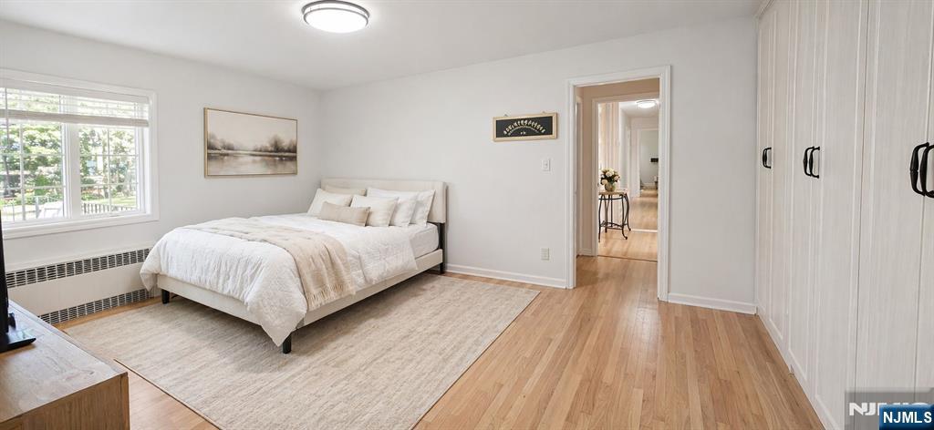 457 Summit Street Norwood, NJ 07648 - Photo 9 of 35 a bedroom with a bed and a window