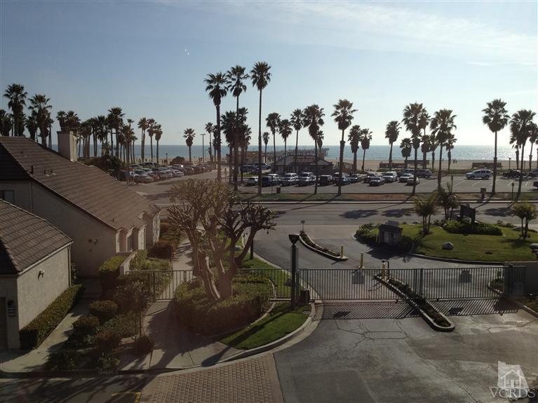 654 Terrace View Place Port Hueneme, CA 93041 - Photo 2 of 30 a view of a swimming pool and lounge chairs