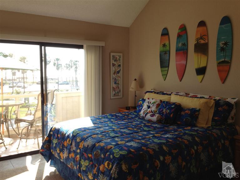 654 Terrace View Place Port Hueneme, CA 93041 - Photo 14 of 30 a bedroom with a large bed and window