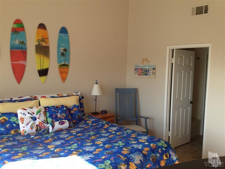 654 Terrace View Place Port Hueneme, CA 93041 - Photo 15 of 30 a bedroom with a bed and a dresser