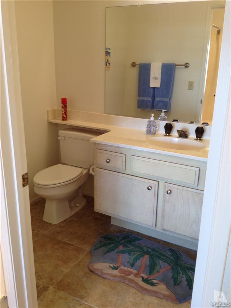 654 Terrace View Place Port Hueneme, CA 93041 - Photo 16 of 30 a bathroom with a sink toilet and mirror