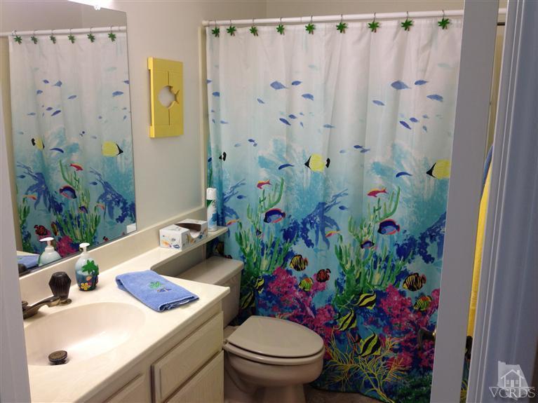 654 Terrace View Place Port Hueneme, CA 93041 - Photo 19 of 30 a bathroom with a sink and a mirror