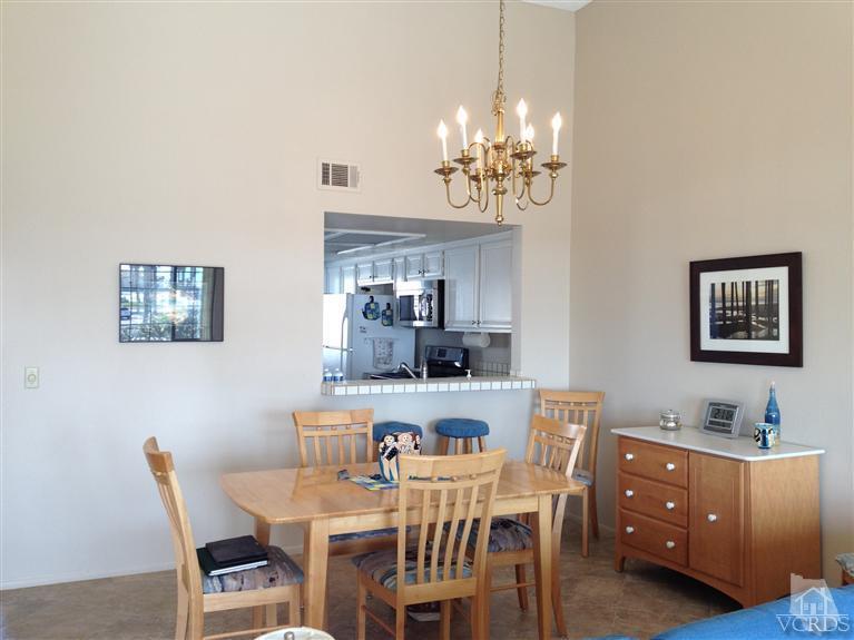 654 Terrace View Place Port Hueneme, CA 93041 - Photo 9 of 30 a view of a dining room with furniture and chandelier