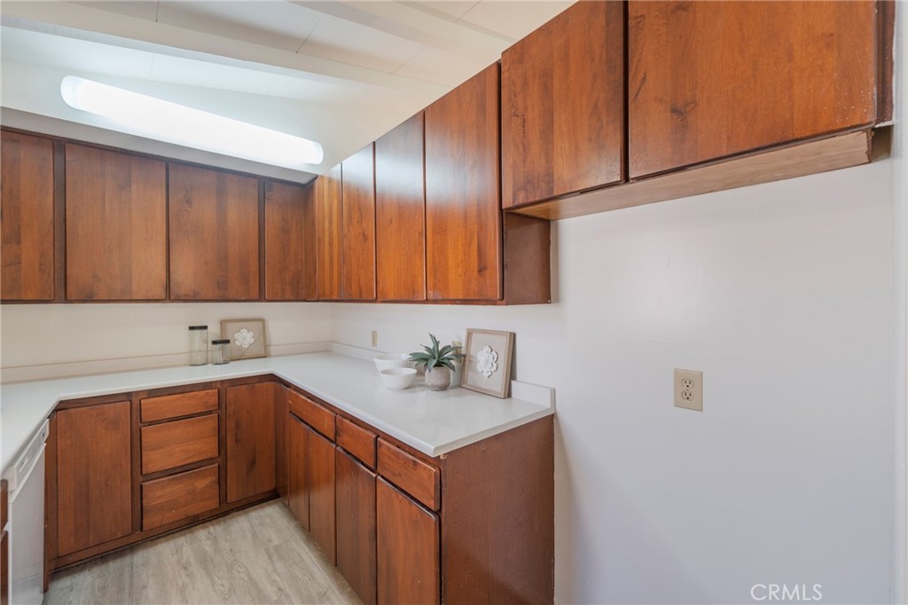 934 North Maple Street Anaheim, CA 92801 - Photo 17 of 47 a kitchen with a sink cabinets and appliances