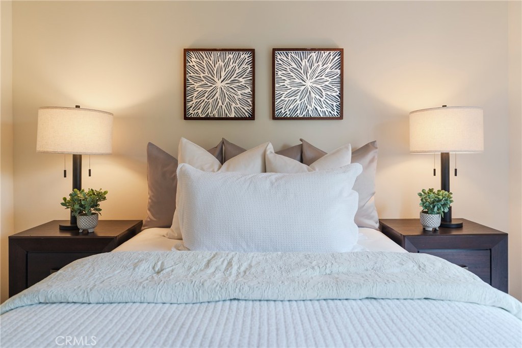 934 North Maple Street Anaheim, CA 92801 - Photo 24 of 47 a bed sitting in a bedroom and lamp