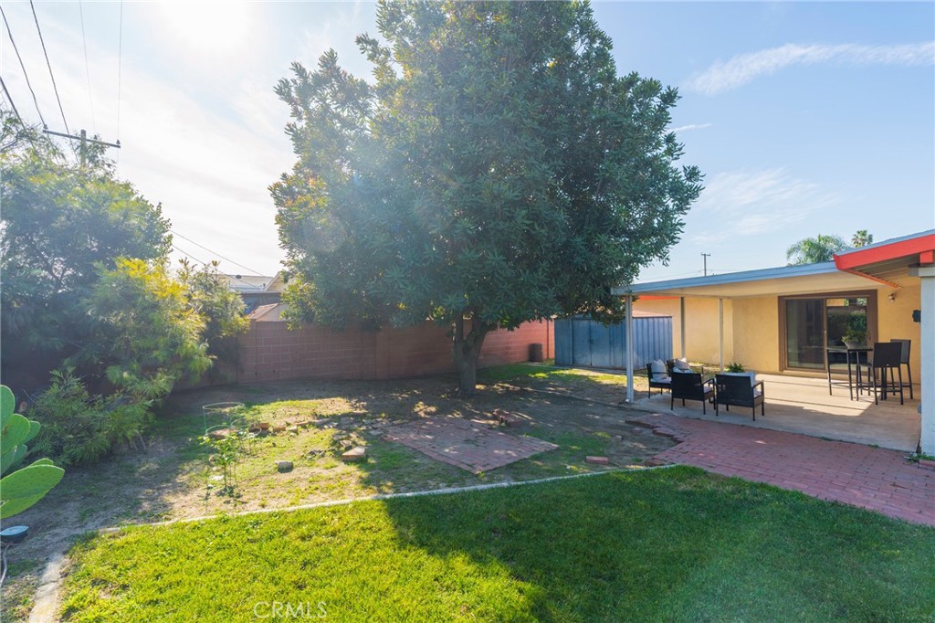 934 North Maple Street Anaheim, CA 92801 - Photo 33 of 47 a backyard of a house with table and chairs