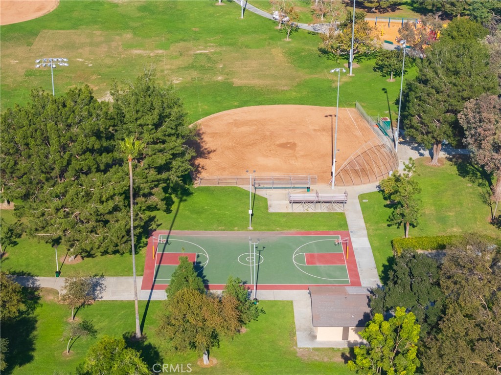 934 North Maple Street Anaheim, CA 92801 - Photo 38 of 47 an aerial view of a tennis ground with a large trees