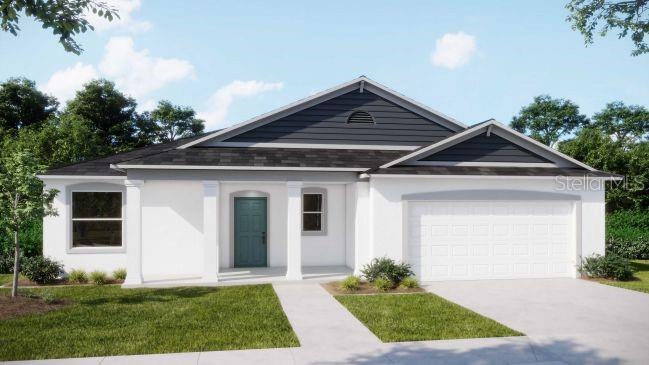 Tbd Mohawk Road Venice, FL 34293 - Photo 1 of 16 a front view of a house with a yard