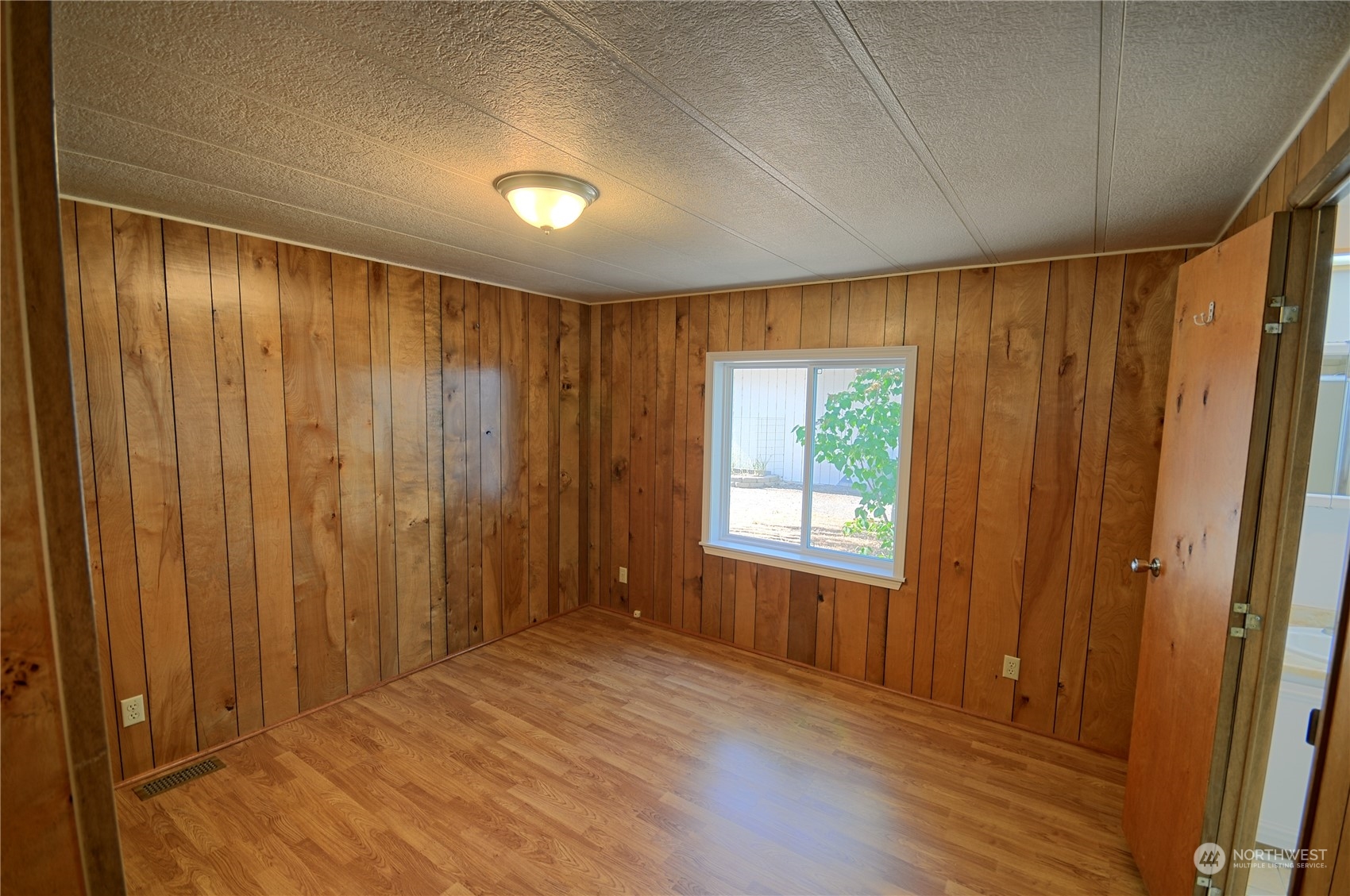 7472 Rd F Southeast, Unit 8 Othello, WA 99344 - Photo 16 of 23 a view of entryway with wooden floor