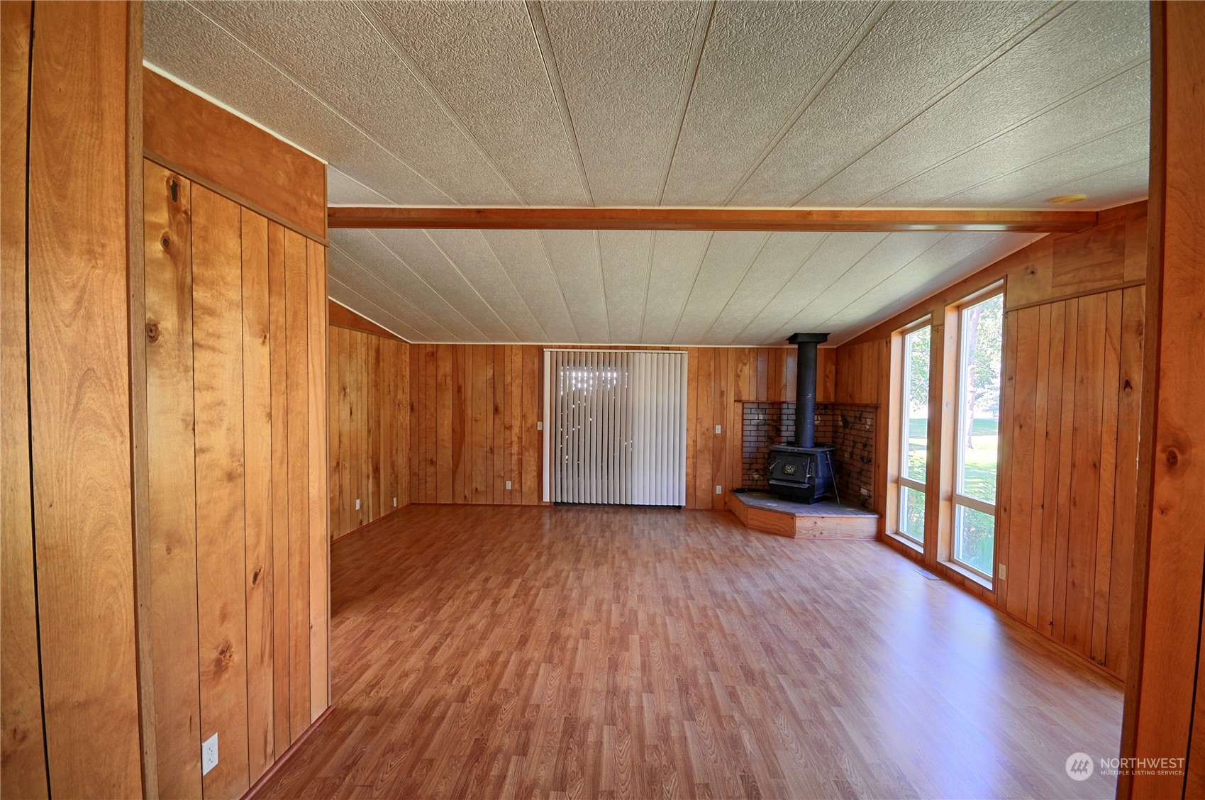 7472 Rd F Southeast, Unit 8 Othello, WA 99344 - Photo 6 of 23 a view of a room with wooden floor and natural light