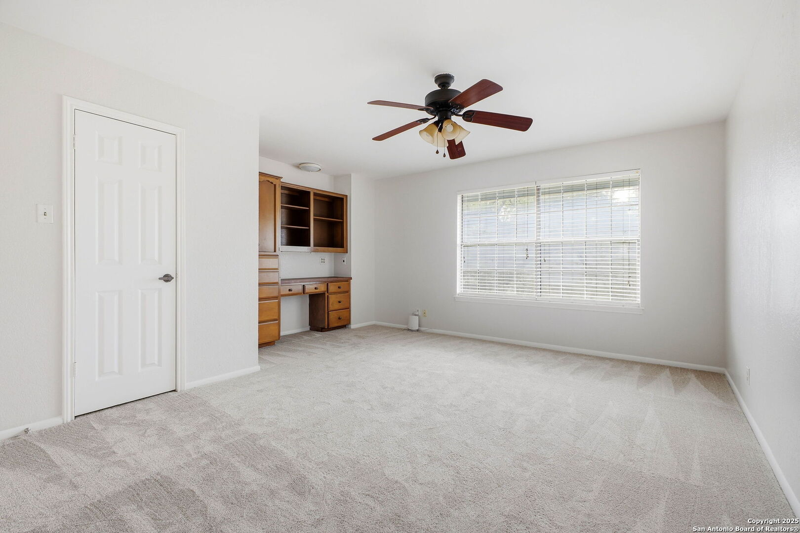 13123 Hunters Spring San Antonio, TX 78230 - Photo 34 of 42 a view of a livingroom with a ceiling fan and window