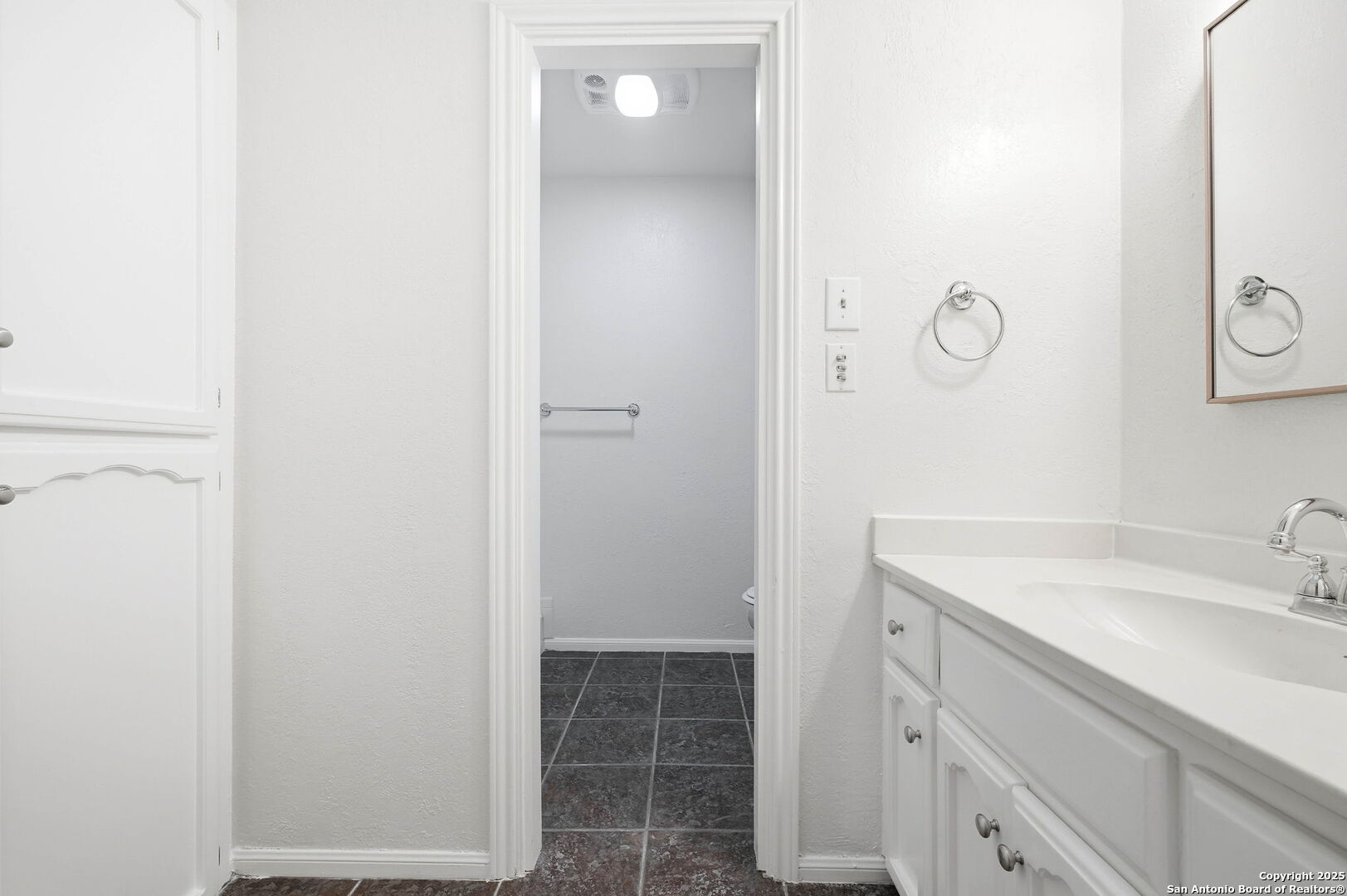 13123 Hunters Spring San Antonio, TX 78230 - Photo 35 of 42 a bathroom with a sink and a mirror