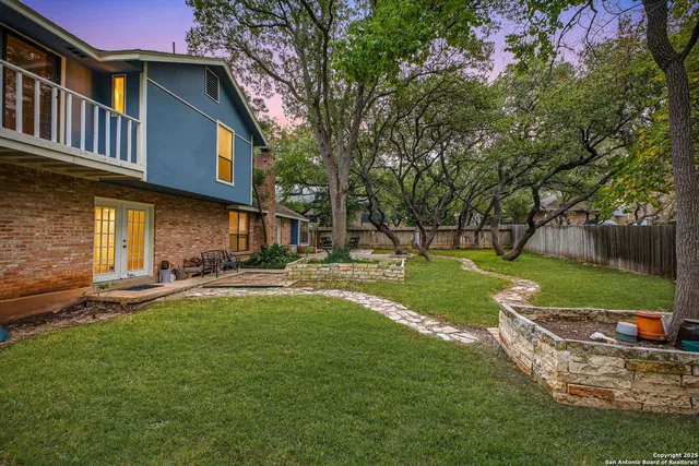 a view of a house with a yard porch and sitting area