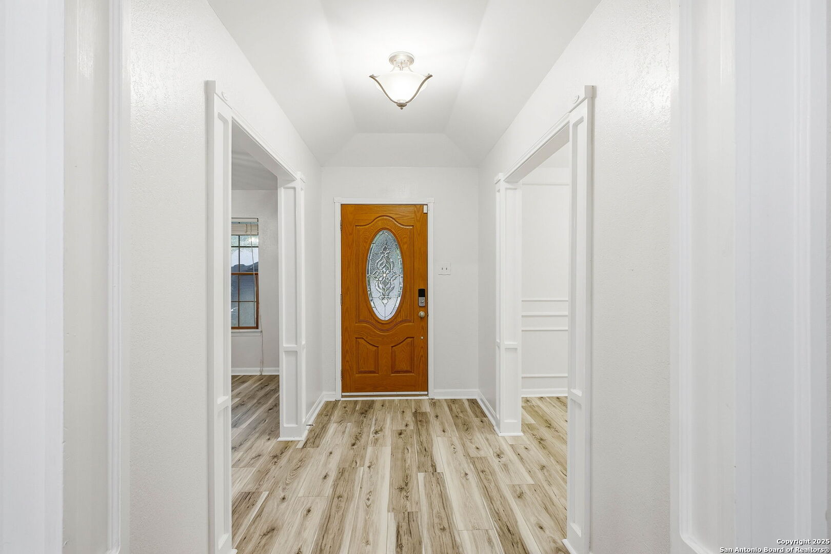 13123 Hunters Spring San Antonio, TX 78230 - Photo 7 of 42 a view of empty room with wooden floor