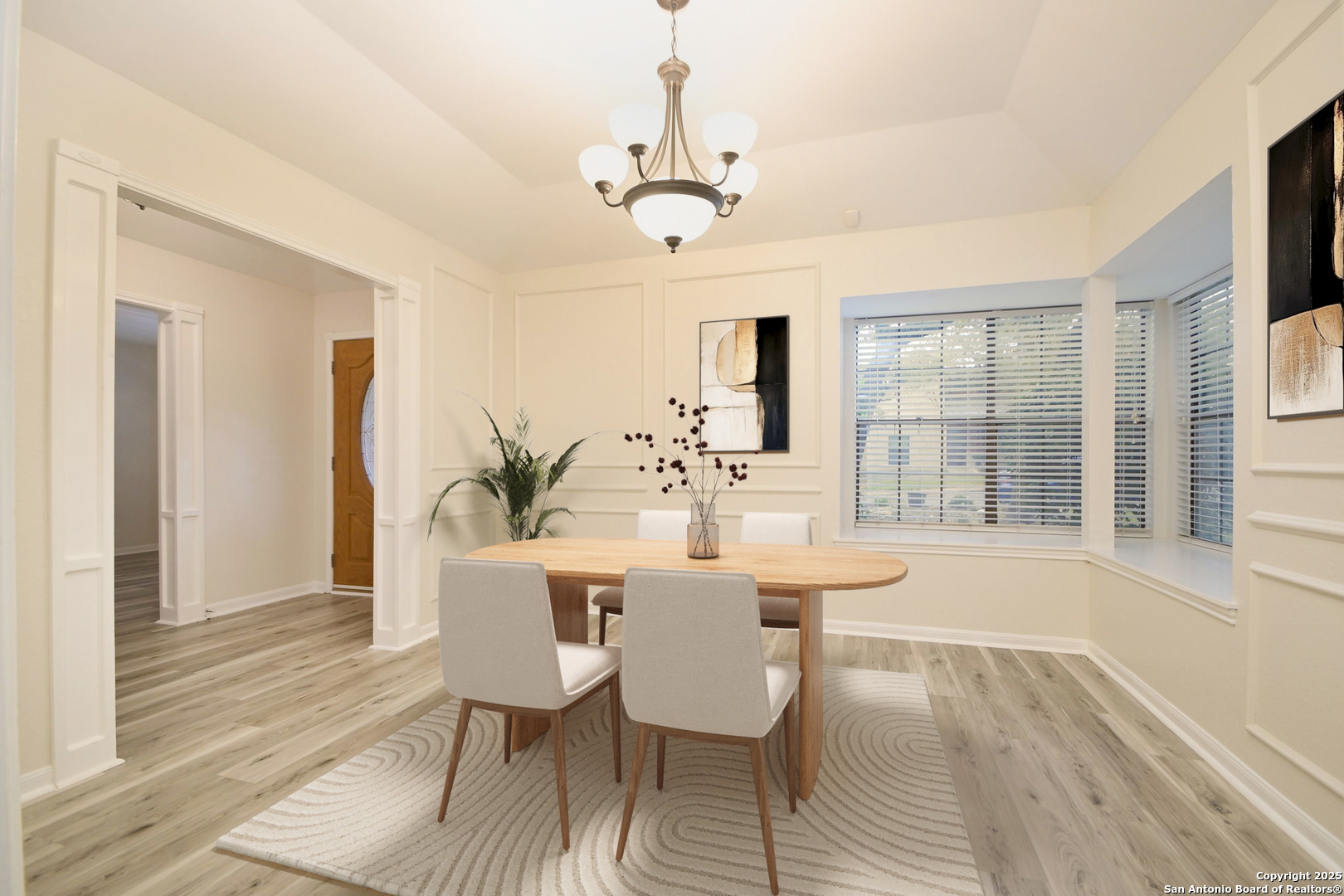 13123 Hunters Spring San Antonio, TX 78230 - Photo 8 of 42 a view of a dining room with furniture window and wooden floor