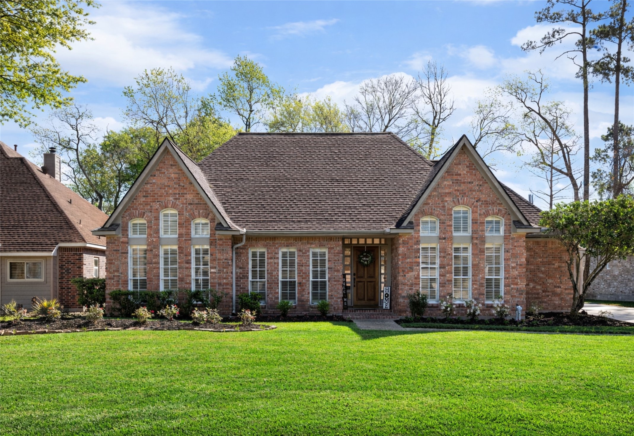 25722 Overlake Drive Spring, TX 77380 - Photo 1 of 50 This beautiful 4 bedroom, 2.5 bathroom custom one-story offers rare character & charm! PRIME LOCATION, located in the Champion Lake neighborhood that offers a private 5-acre lake & scenic surroundings. Impressive curb appeal w/ fresh landscaping, fresh mulch, and recently pressure washed.