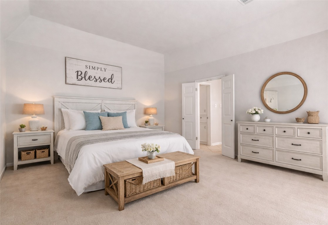 25722 Overlake Drive Spring, TX 77380 - Photo 24 of 50 Access the primary ensuite bathroom through the large French doors.