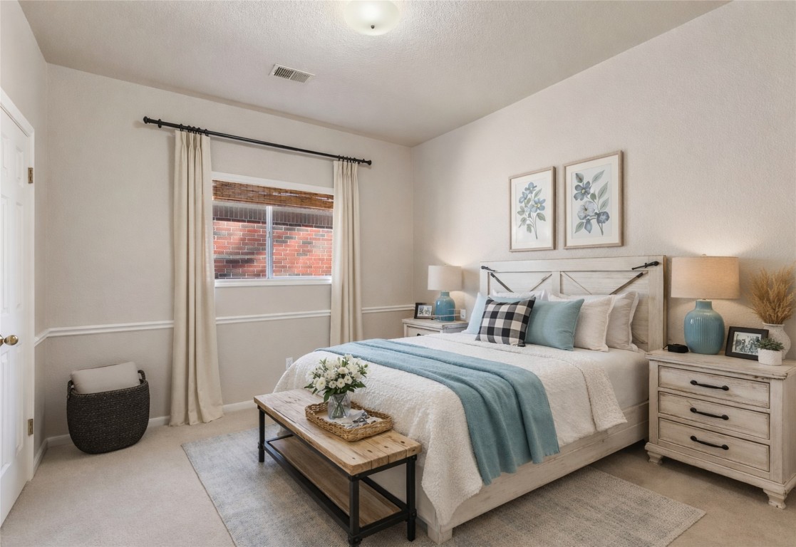 25722 Overlake Drive Spring, TX 77380 - Photo 31 of 50 A generously sized secondary bedroom featuring dual closets (not pictured), each with custom built-ins.