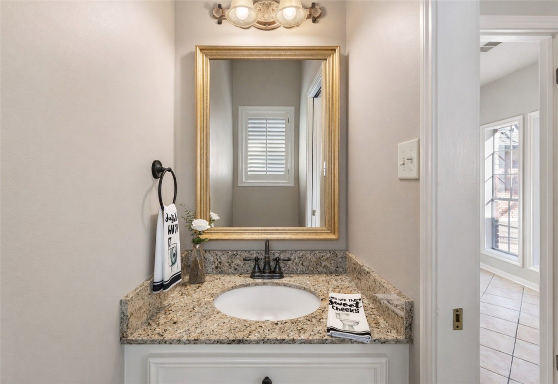 25722 Overlake Drive Spring, TX 77380 - Photo 36 of 50 Half bath shown with wallpaper removed and virtually painted in soft, neutral tones.