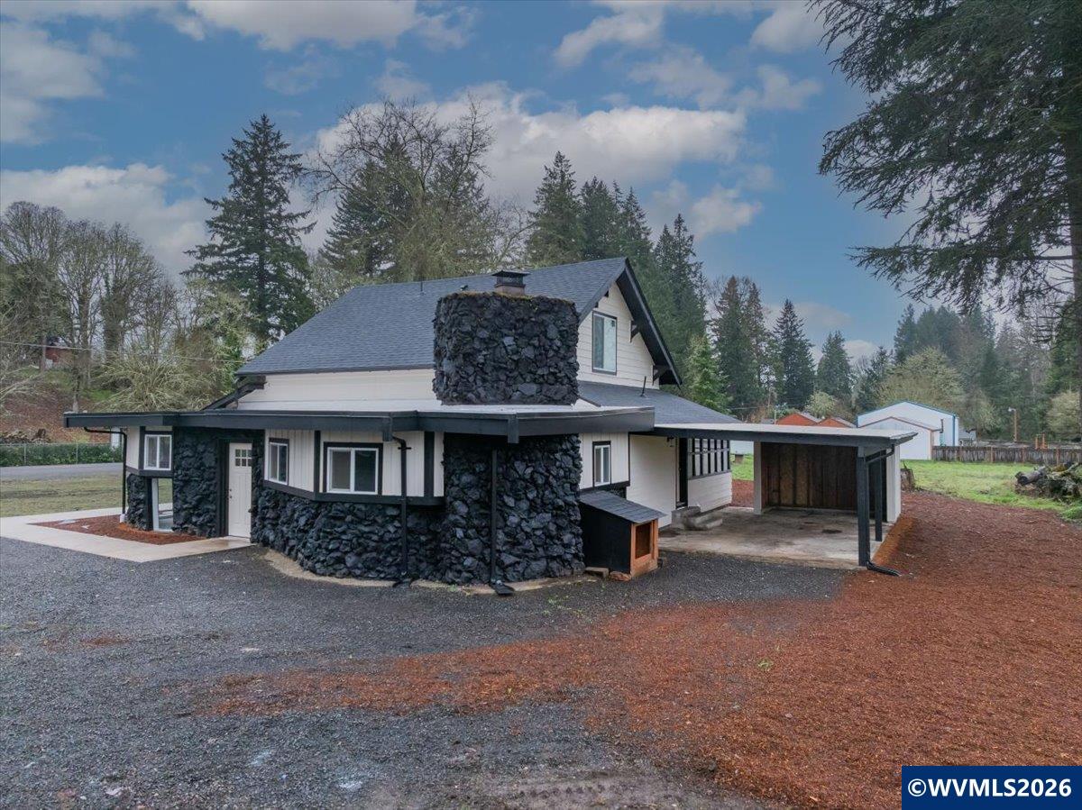 28411 Liberty Road Sweet Home, OR 97386 - Photo 10 of 50 front view of a house with a yard