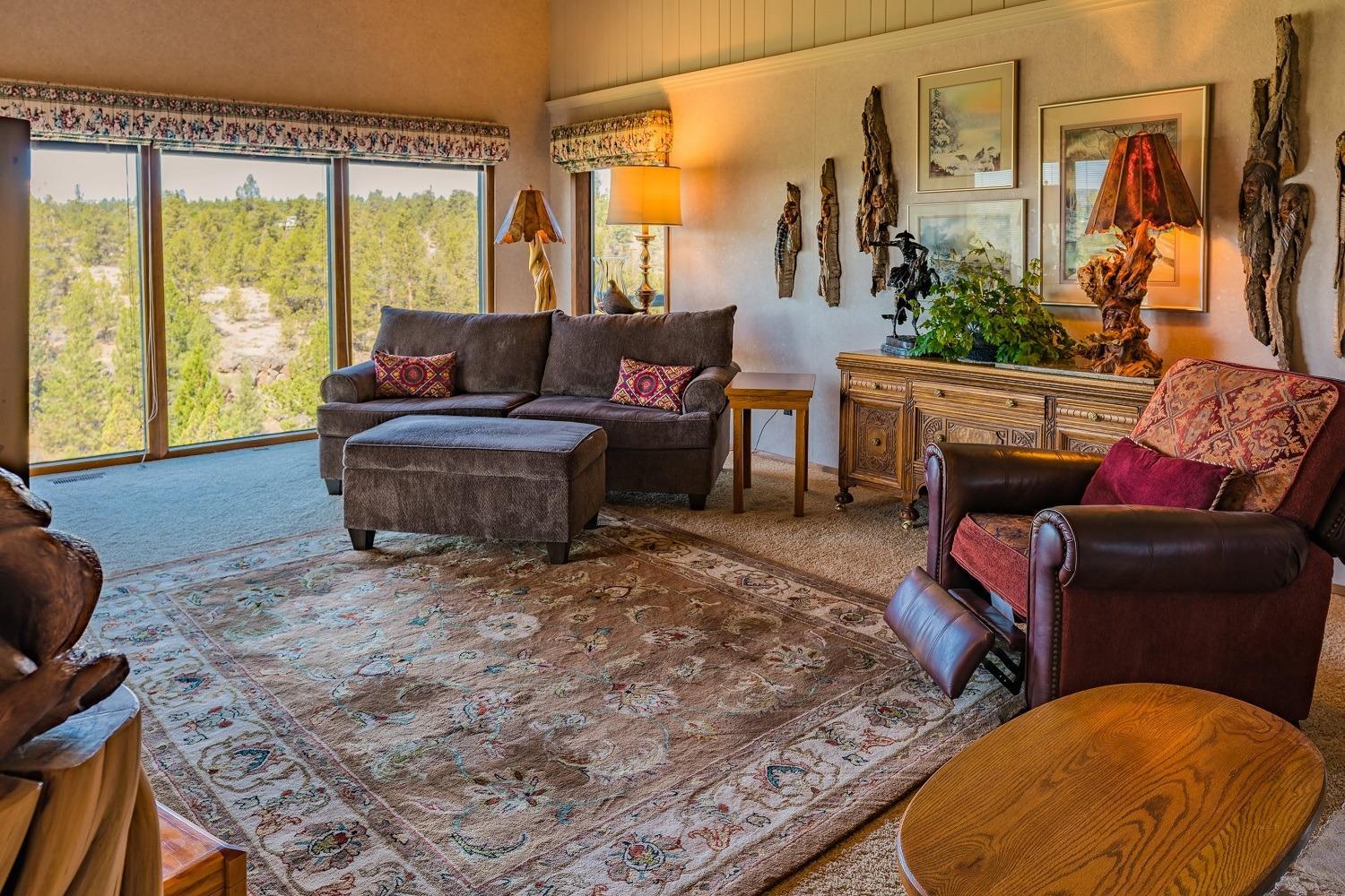 65035 Hopper Road Bend, OR 97703 - Photo 5 of 21 a living room with furniture and a large window