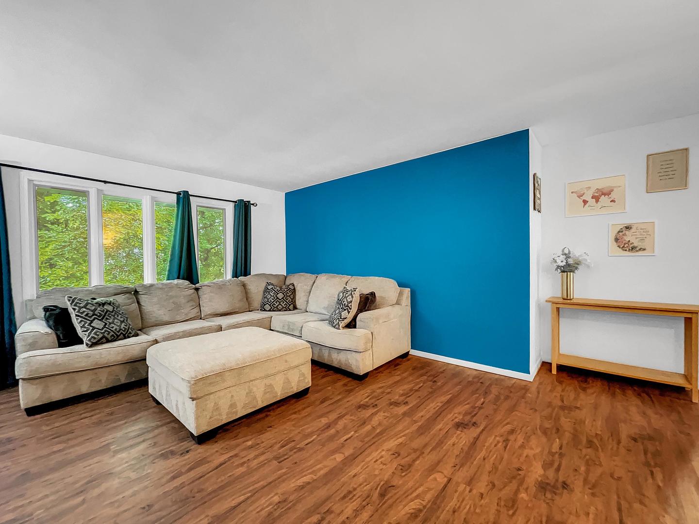 25 Aldon Road Montgomery, IL 60538 - Photo 14 of 38 a living room with furniture and a large window