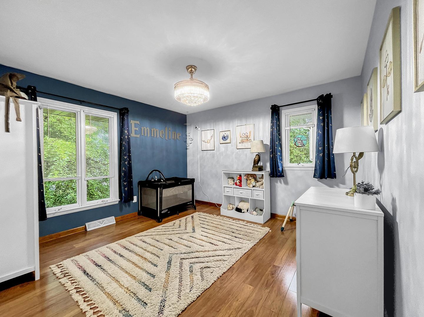 25 Aldon Road Montgomery, IL 60538 - Photo 19 of 38 a living room with furniture and a window