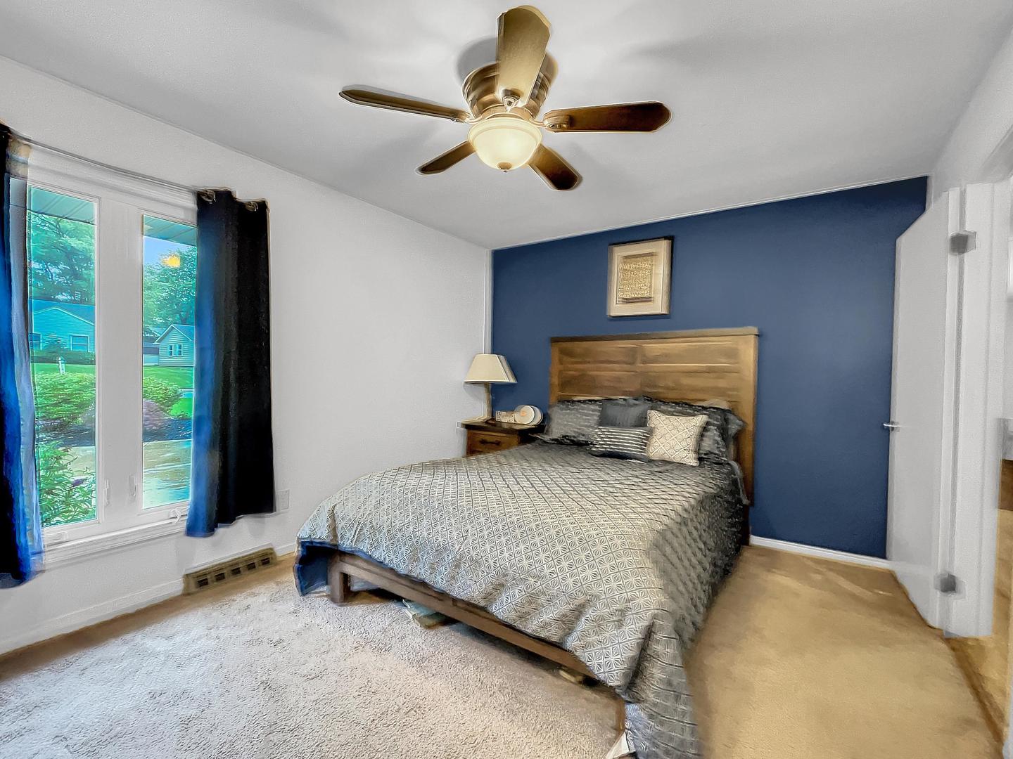 25 Aldon Road Montgomery, IL 60538 - Photo 25 of 38 a bedroom with a bed and a large window