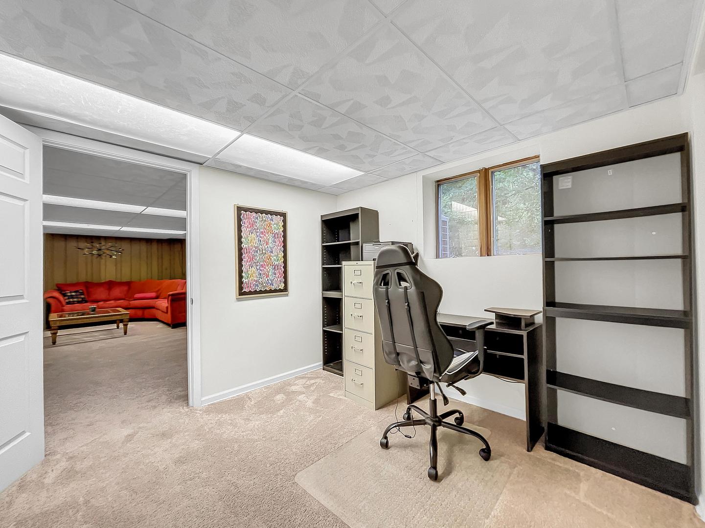 25 Aldon Road Montgomery, IL 60538 - Photo 29 of 38 a view of a workspace with furniture and windows