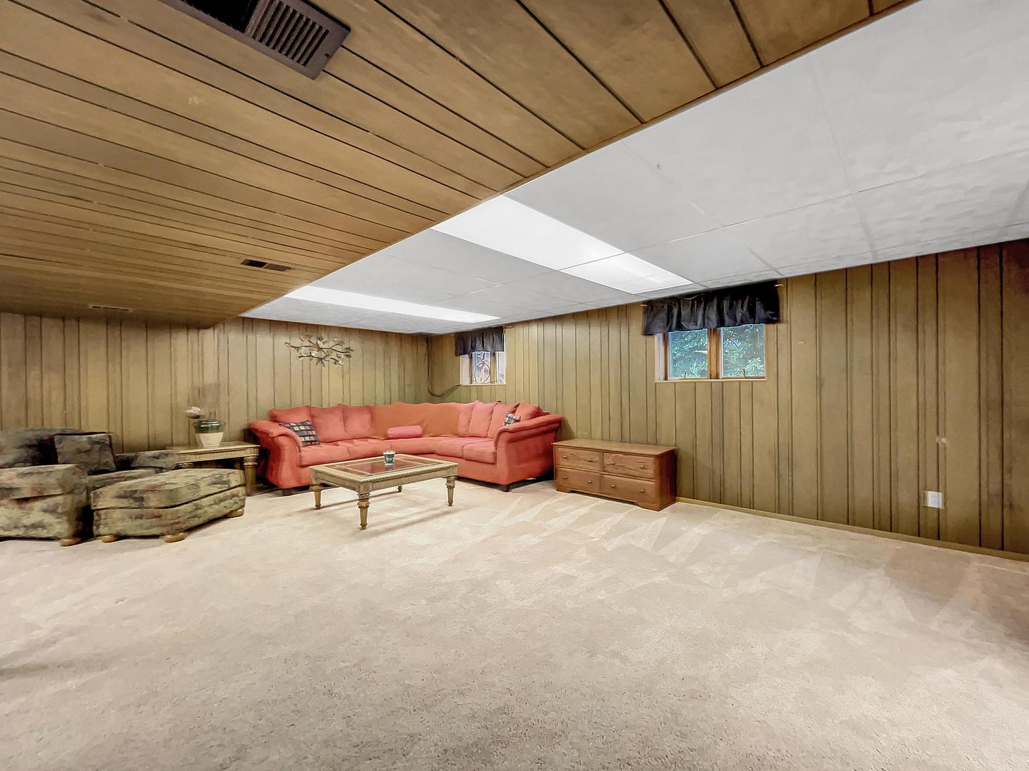 25 Aldon Road Montgomery, IL 60538 - Photo 31 of 38 a view of a patio with table and chairs under an umbrella