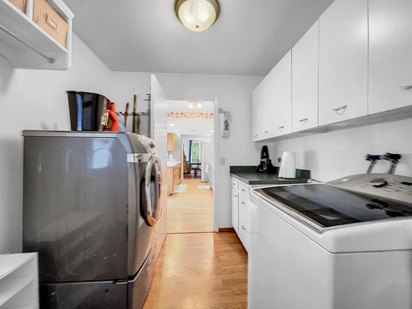 25 Aldon Road Montgomery, IL 60538 - Photo 36 of 38 a kitchen with a refrigerator and a sink
