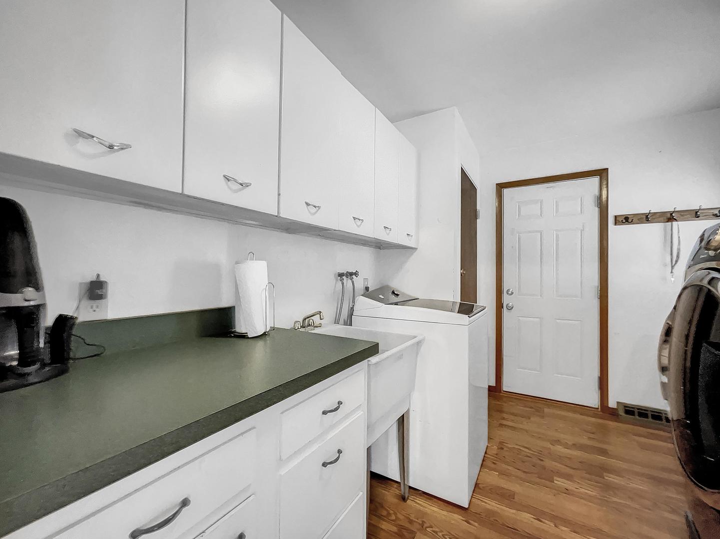 25 Aldon Road Montgomery, IL 60538 - Photo 37 of 38 a kitchen with granite countertop white cabinets and refrigerator