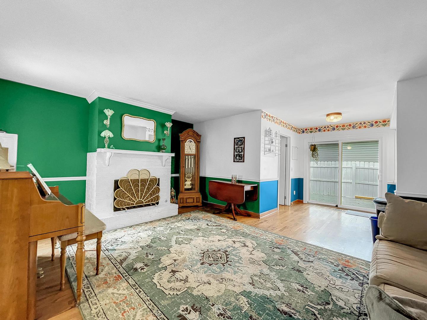 25 Aldon Road Montgomery, IL 60538 - Photo 4 of 38 a living room with furniture and a table