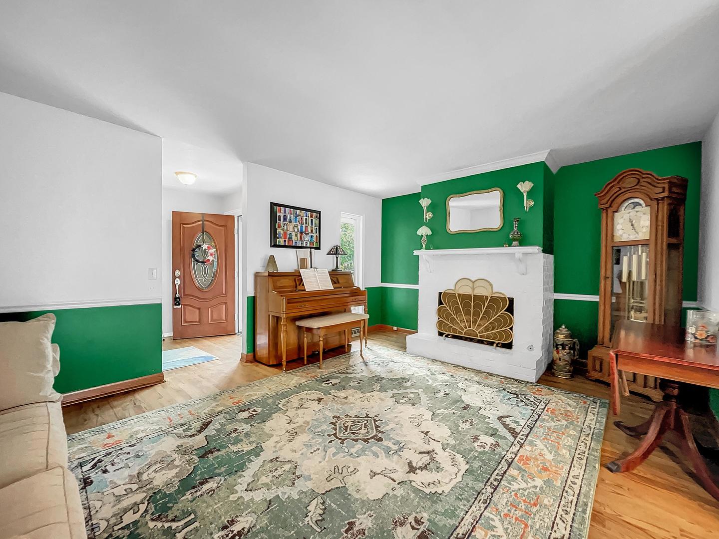 25 Aldon Road Montgomery, IL 60538 - Photo 6 of 38 a living room with furniture and a fireplace