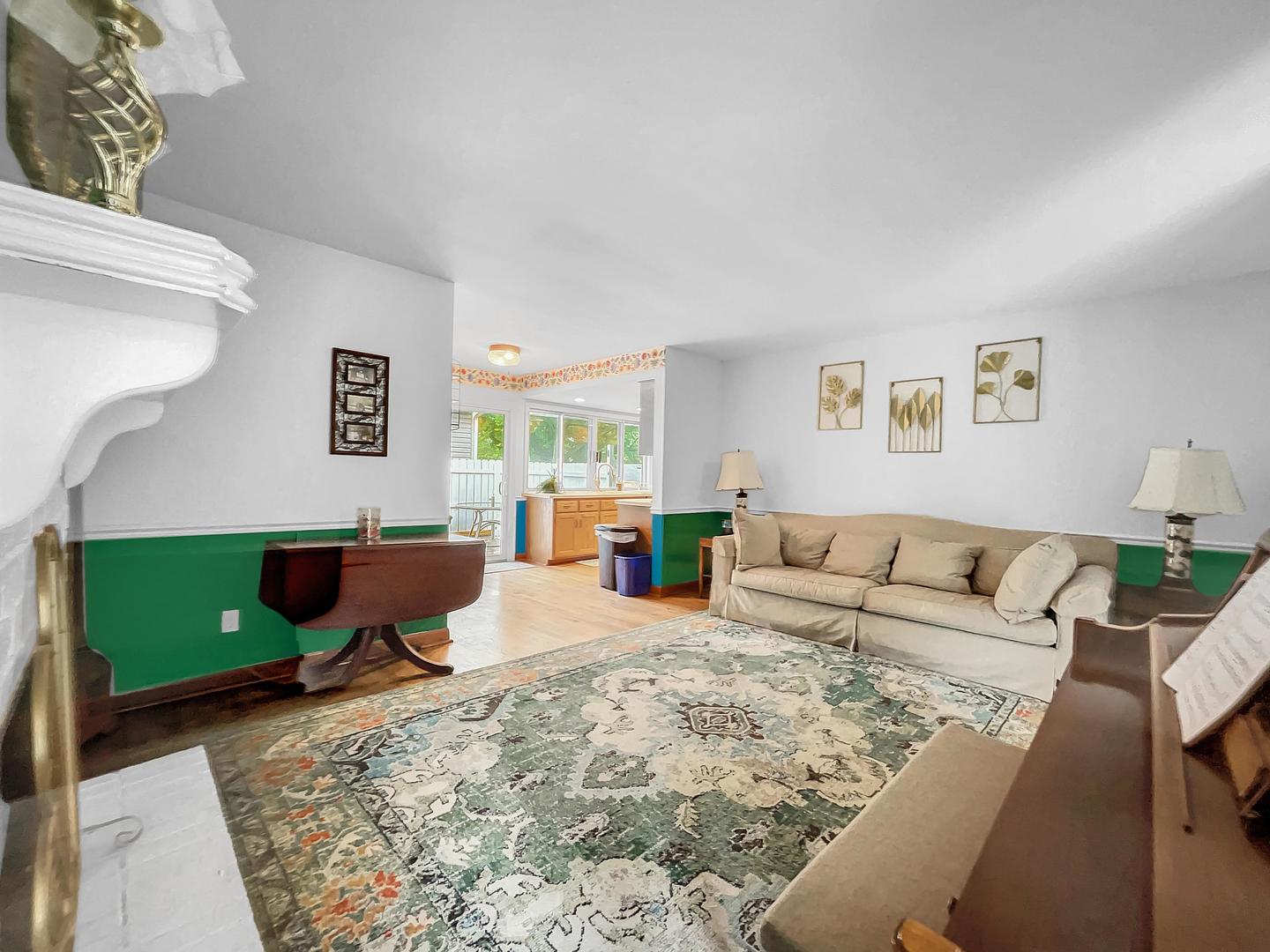 25 Aldon Road Montgomery, IL 60538 - Photo 7 of 38 a living room with furniture and a window