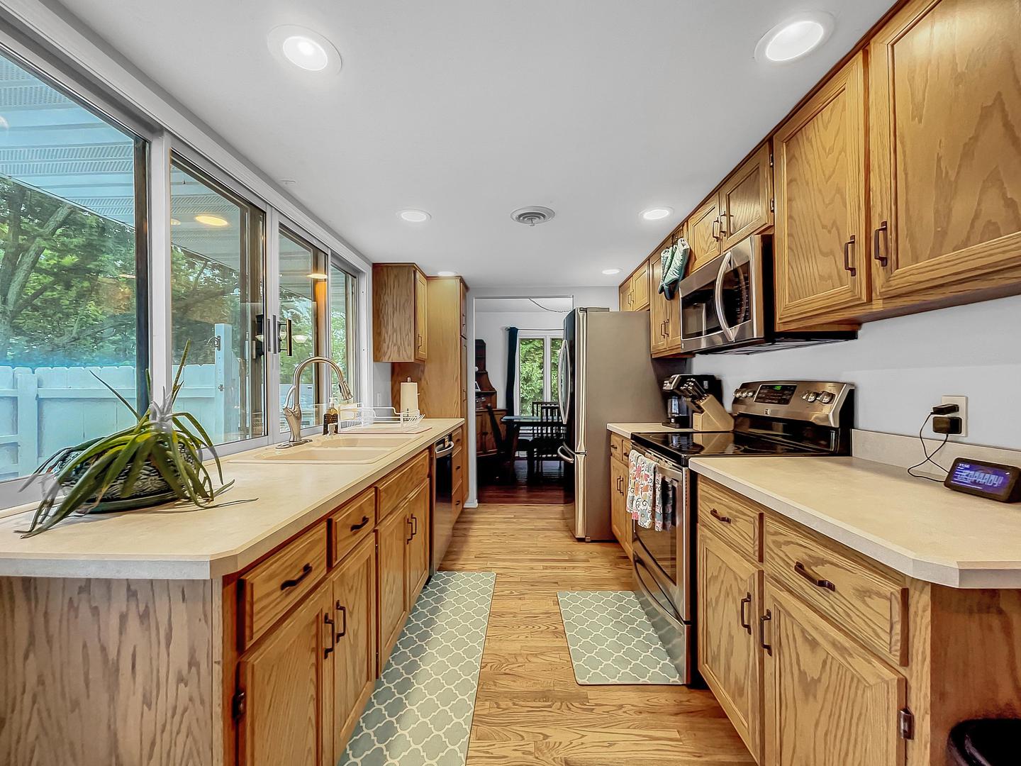 25 Aldon Road Montgomery, IL 60538 - Photo 9 of 38 a kitchen with a sink and cabinets