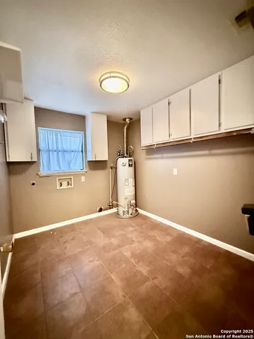 a view of a kitchen with a sink
