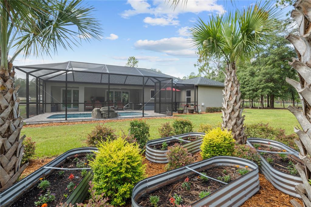 12929 Southwest 89th Street Dunnellon, FL 34432 - Photo 57 of 76 a view of swimming pool with outdoor seating and yard